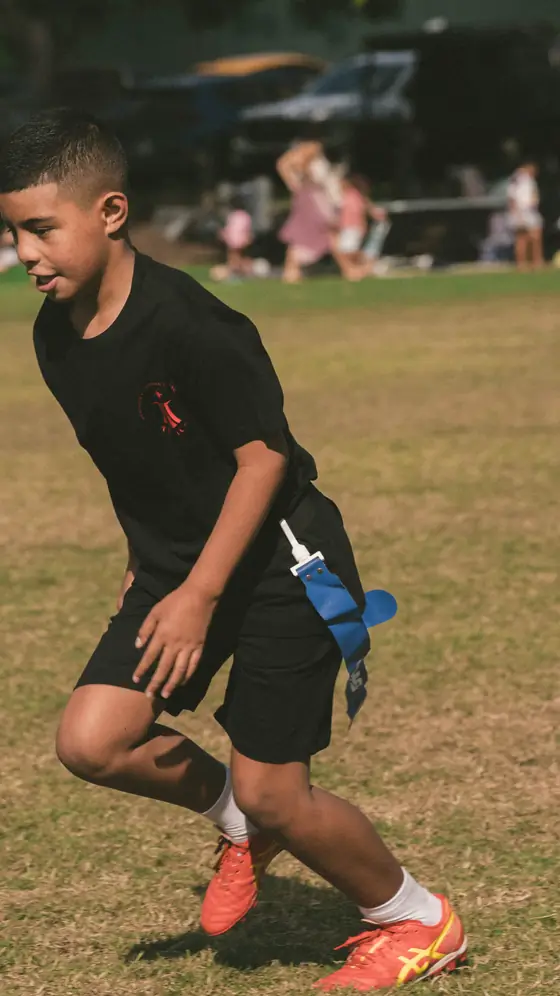 A young player running on the field