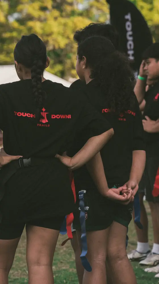 Participants in TRAILS Touchdown shirts waiting to start